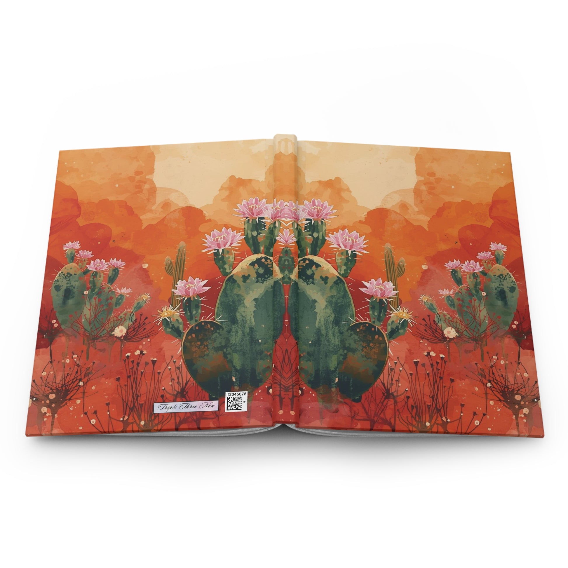 Open book with a cactus and flower illustration on an orange background