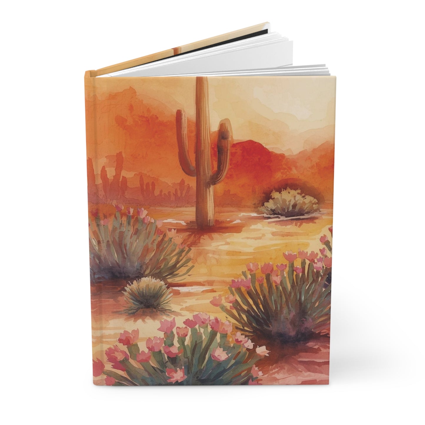 Notebook with a desert landscape design featuring cacti and flowers on the cover.
