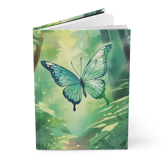 Notebook with a green butterfly design on a white background