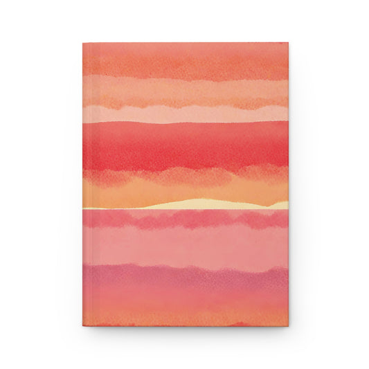 Notebook with watercolor design of horizontal stripes in pink, orange, and red on a white background