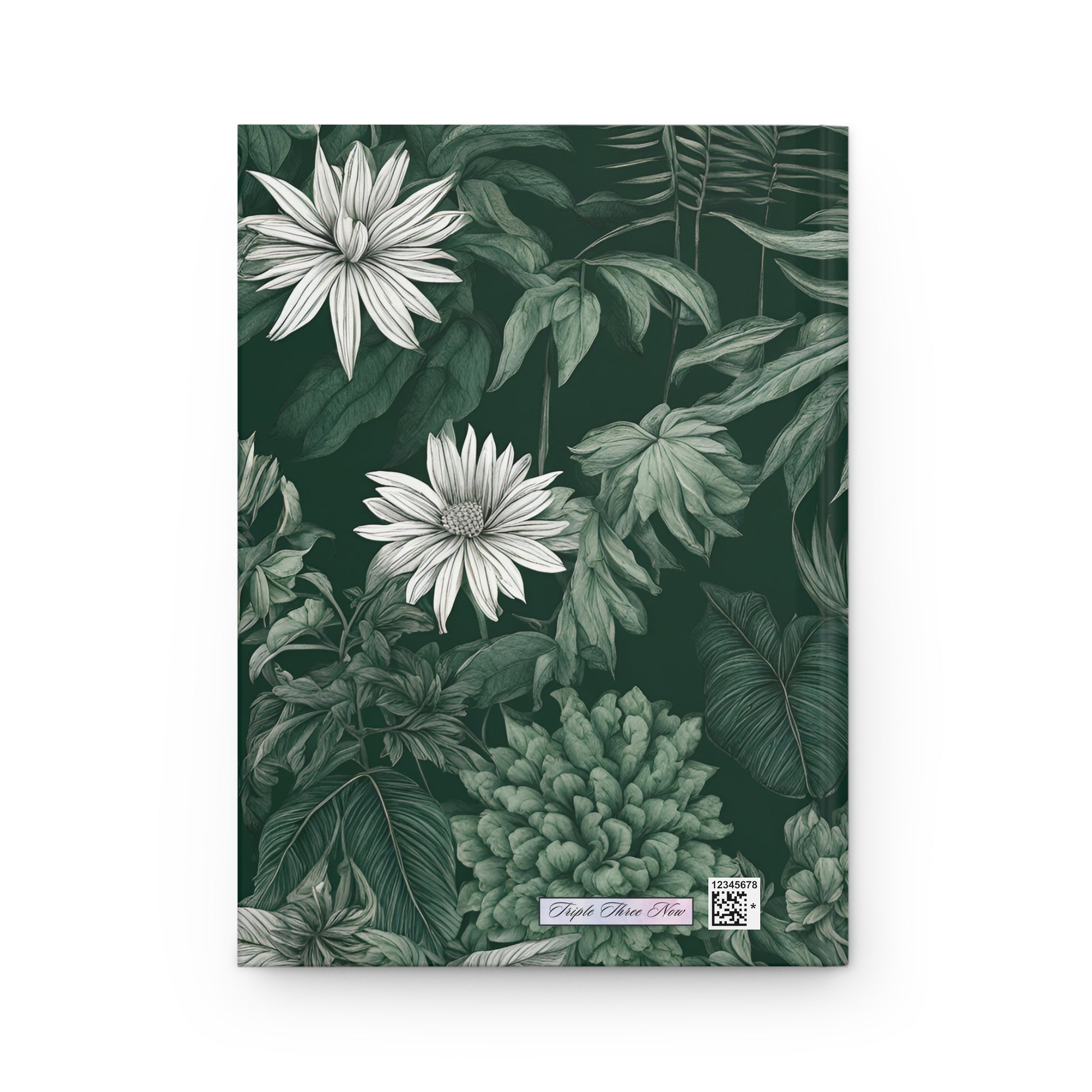 Notebook with green floral design on a white background