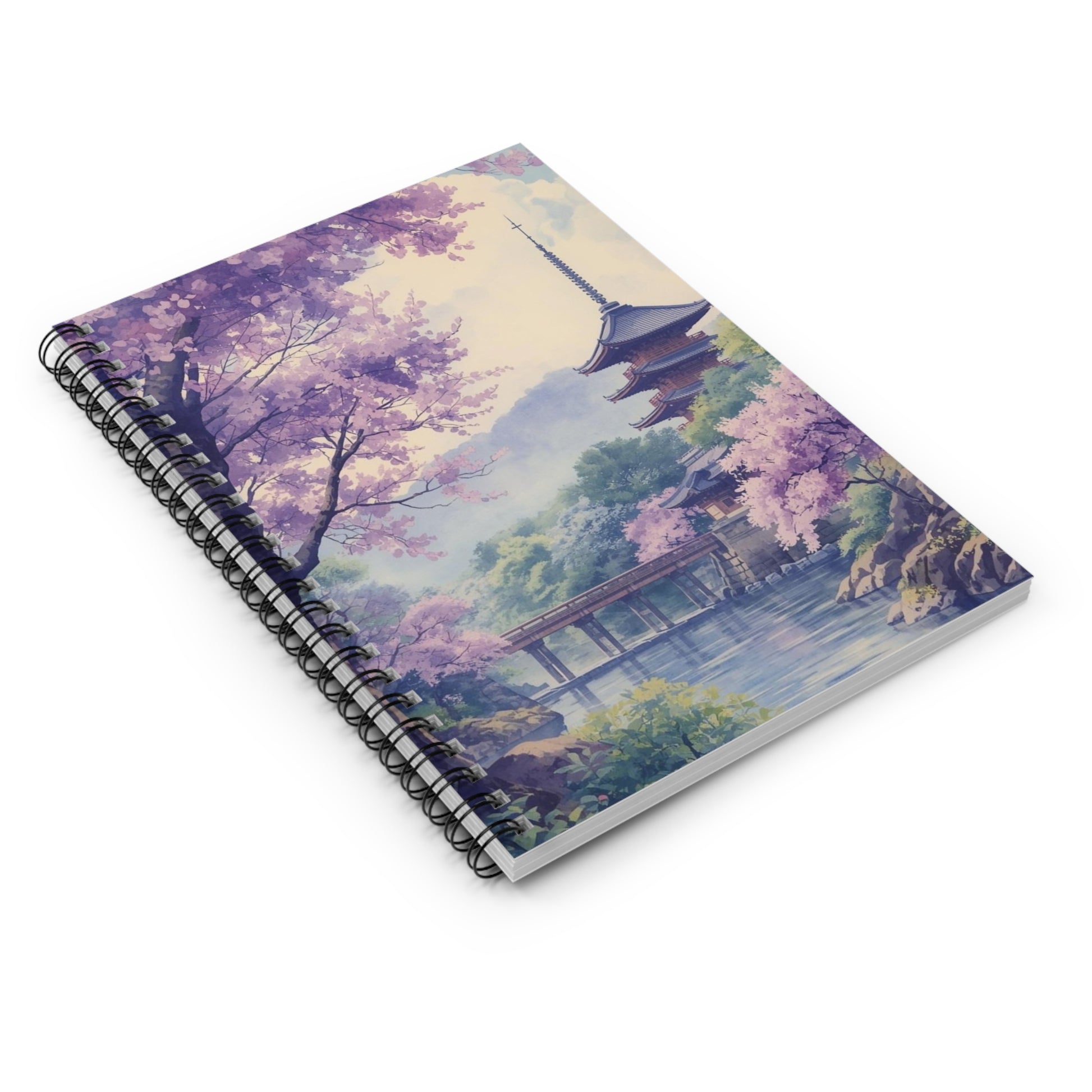 Notebook with a scenic design of a pagoda and cherry blossoms on a white background