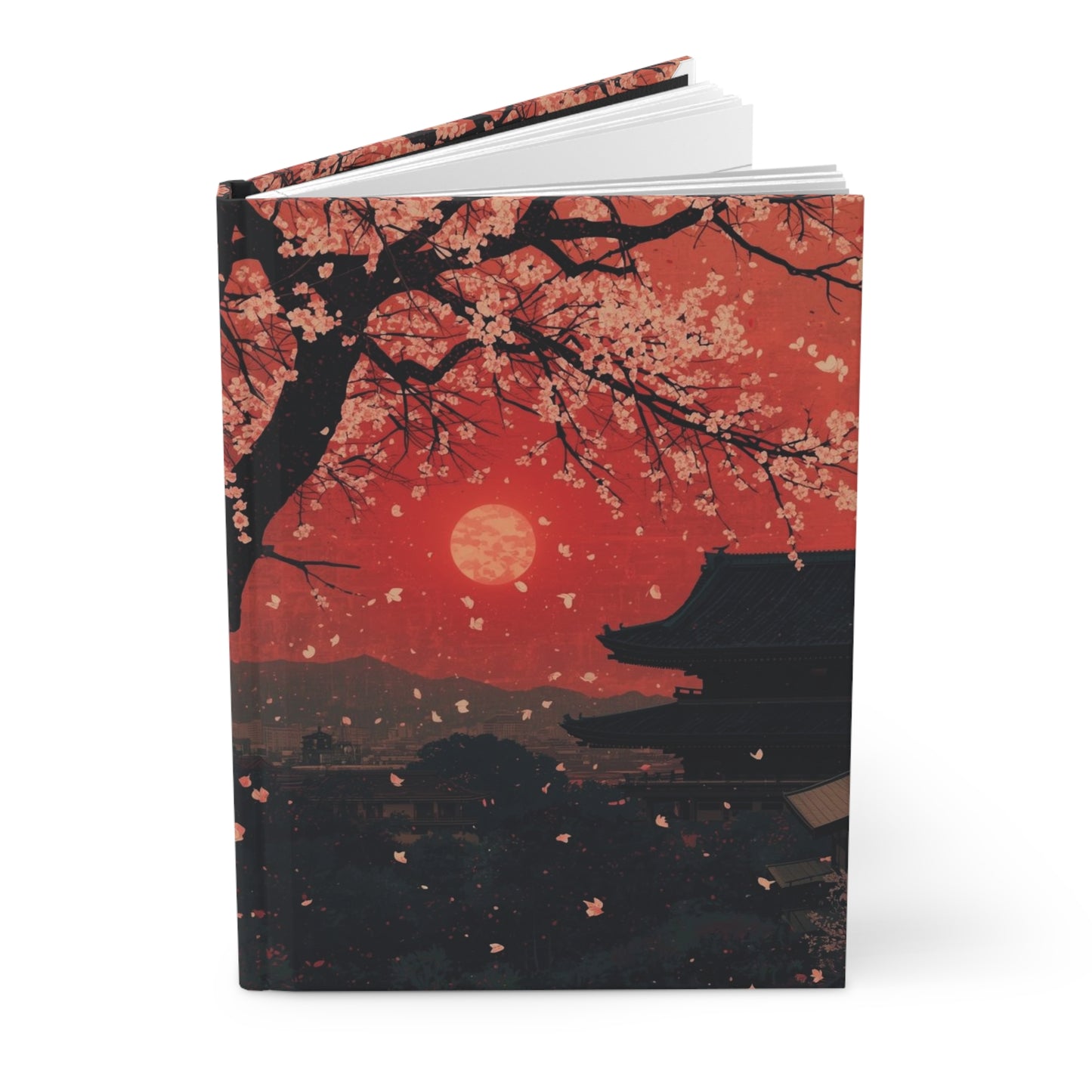 Notebook with cherry blossom design on a white background