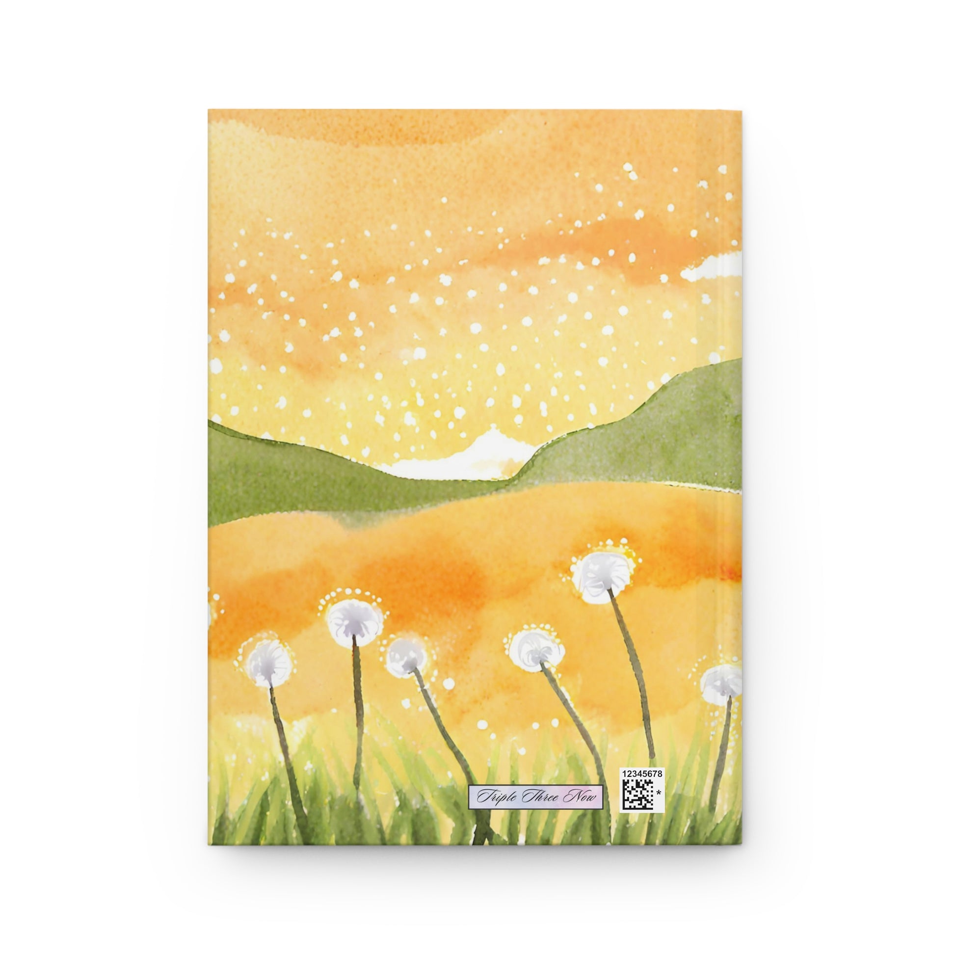 Notebook cover with a scenic illustration of dandelions and rolling hills on a yellow background.