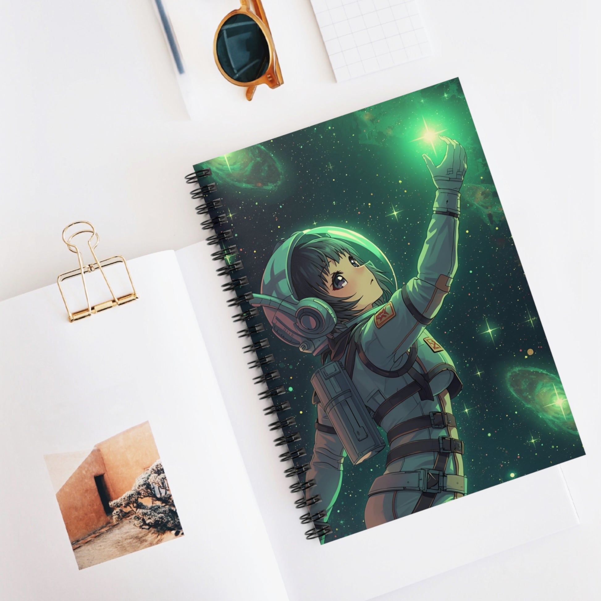 Notebook with an astronaut design on a white surface