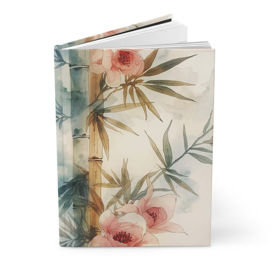 Notebook with floral and bamboo design on a white background
