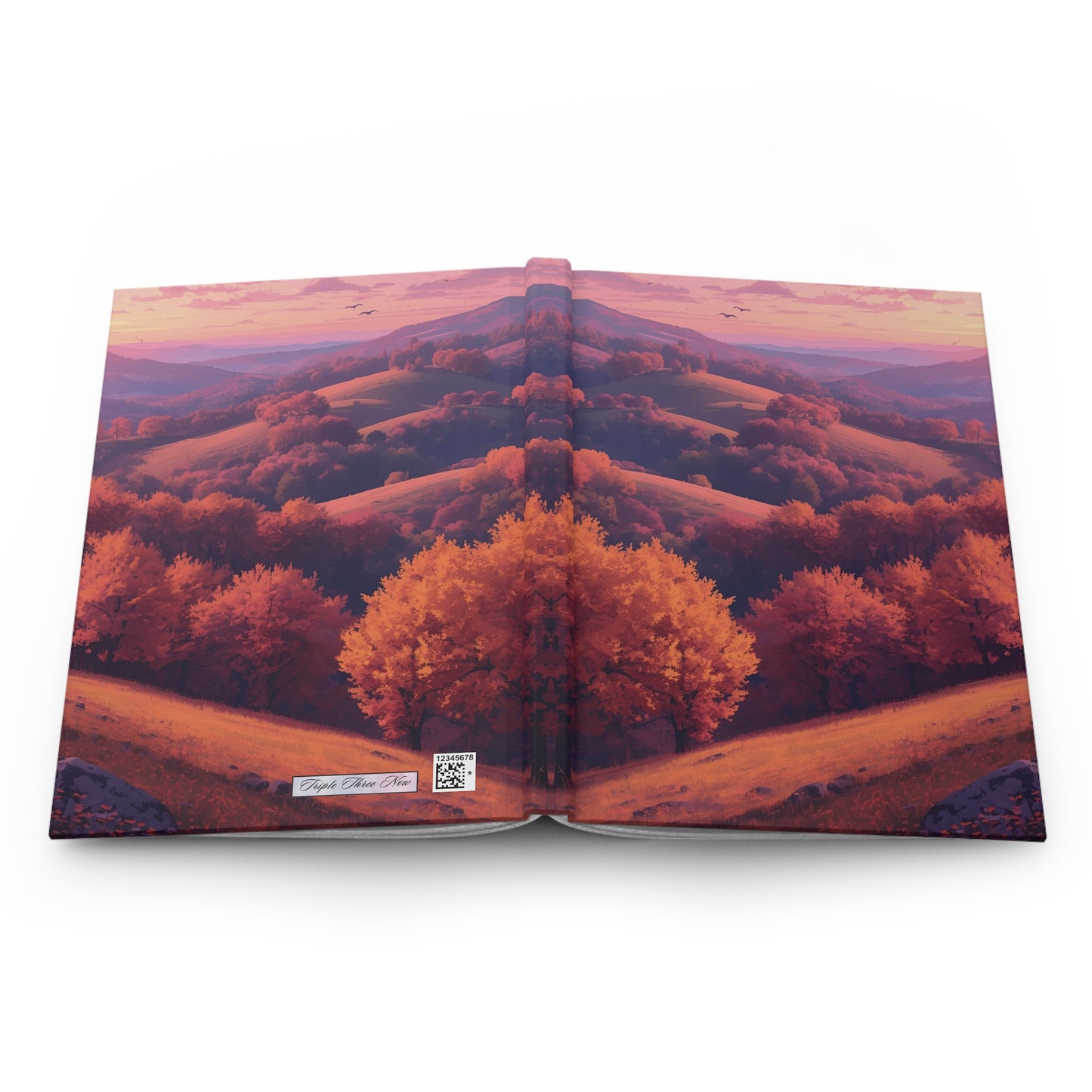 Open book with a landscape of trees and hills on a white background