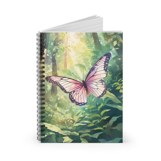 Notebook with a butterfly design on a forest cover on a white background