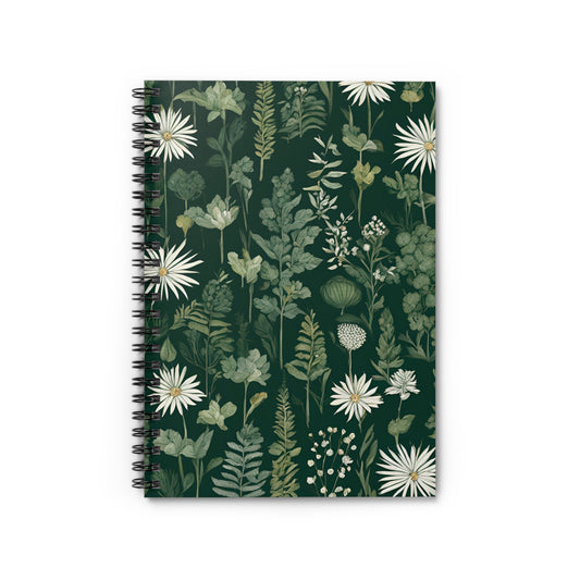 Notebook with floral design on a green background