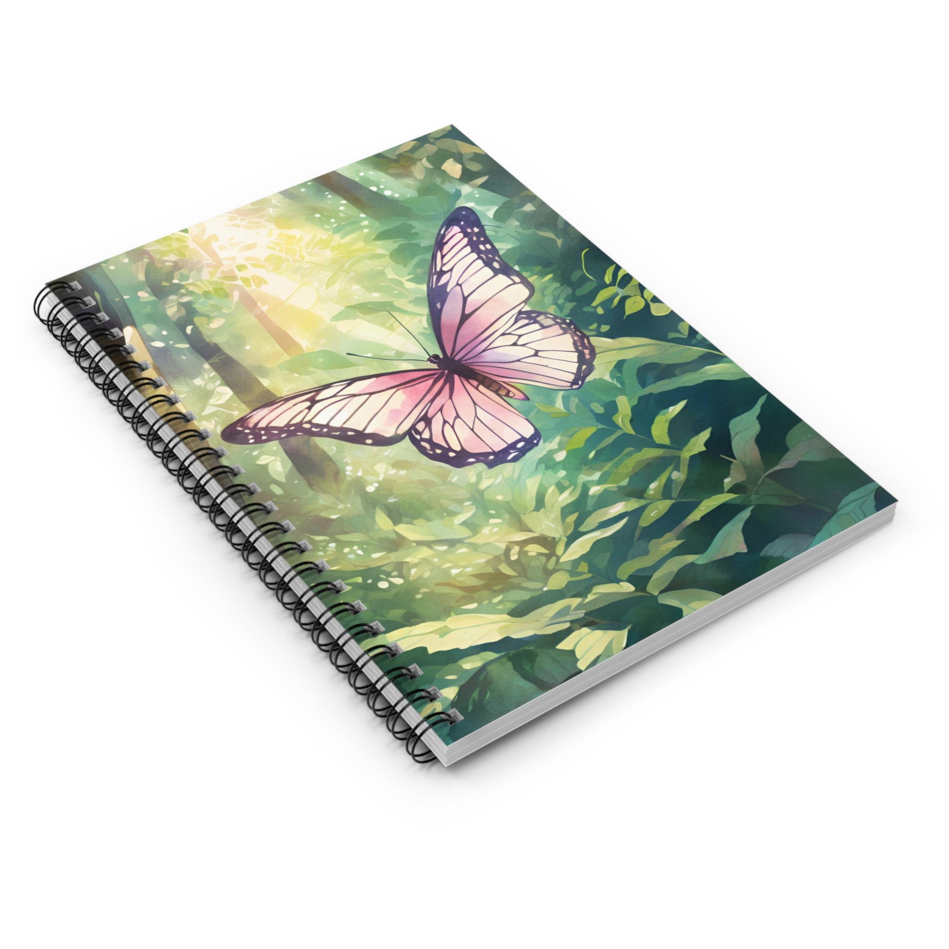 Notebook with a butterfly design on a green leafy background