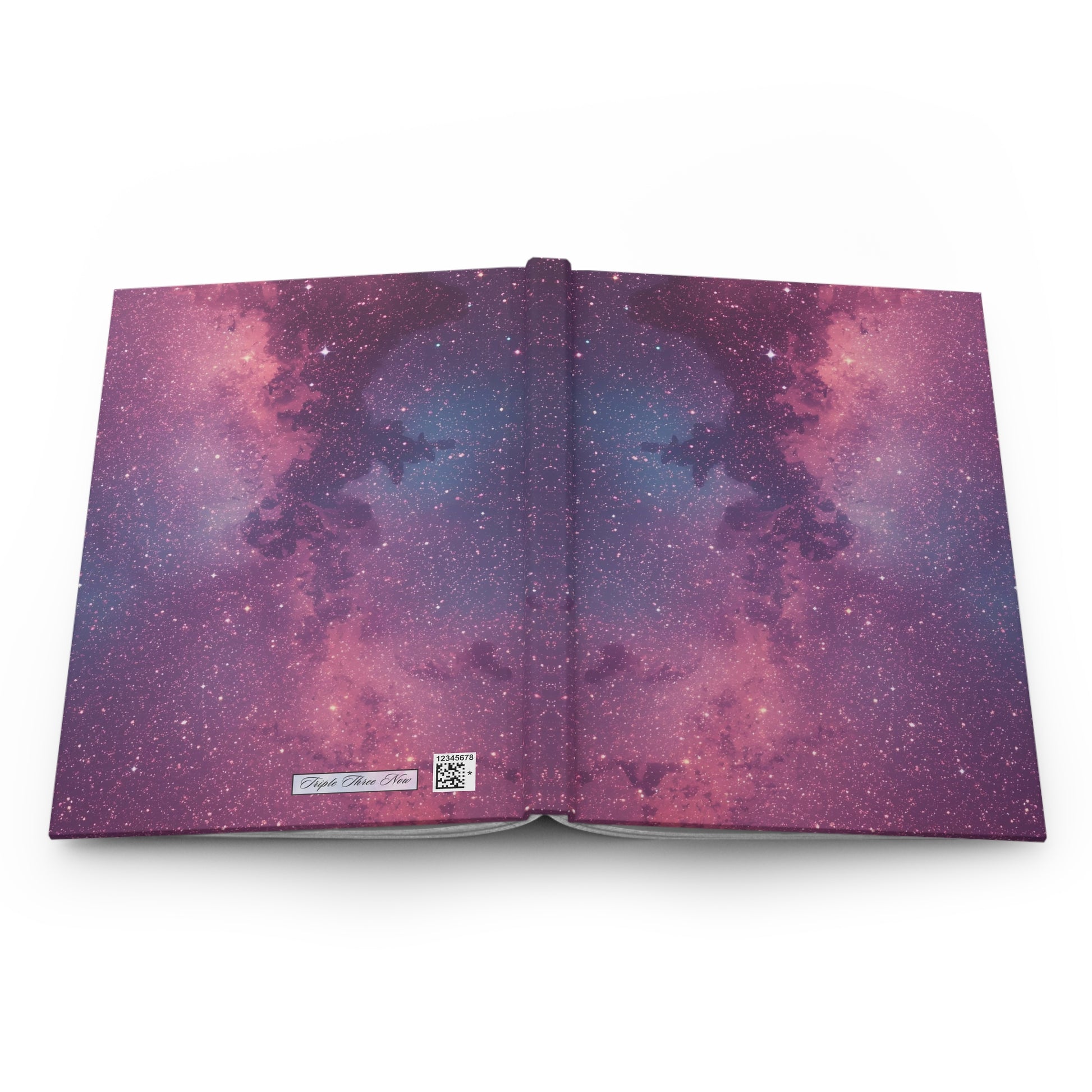 Open book with a galaxy-themed cover on a white background