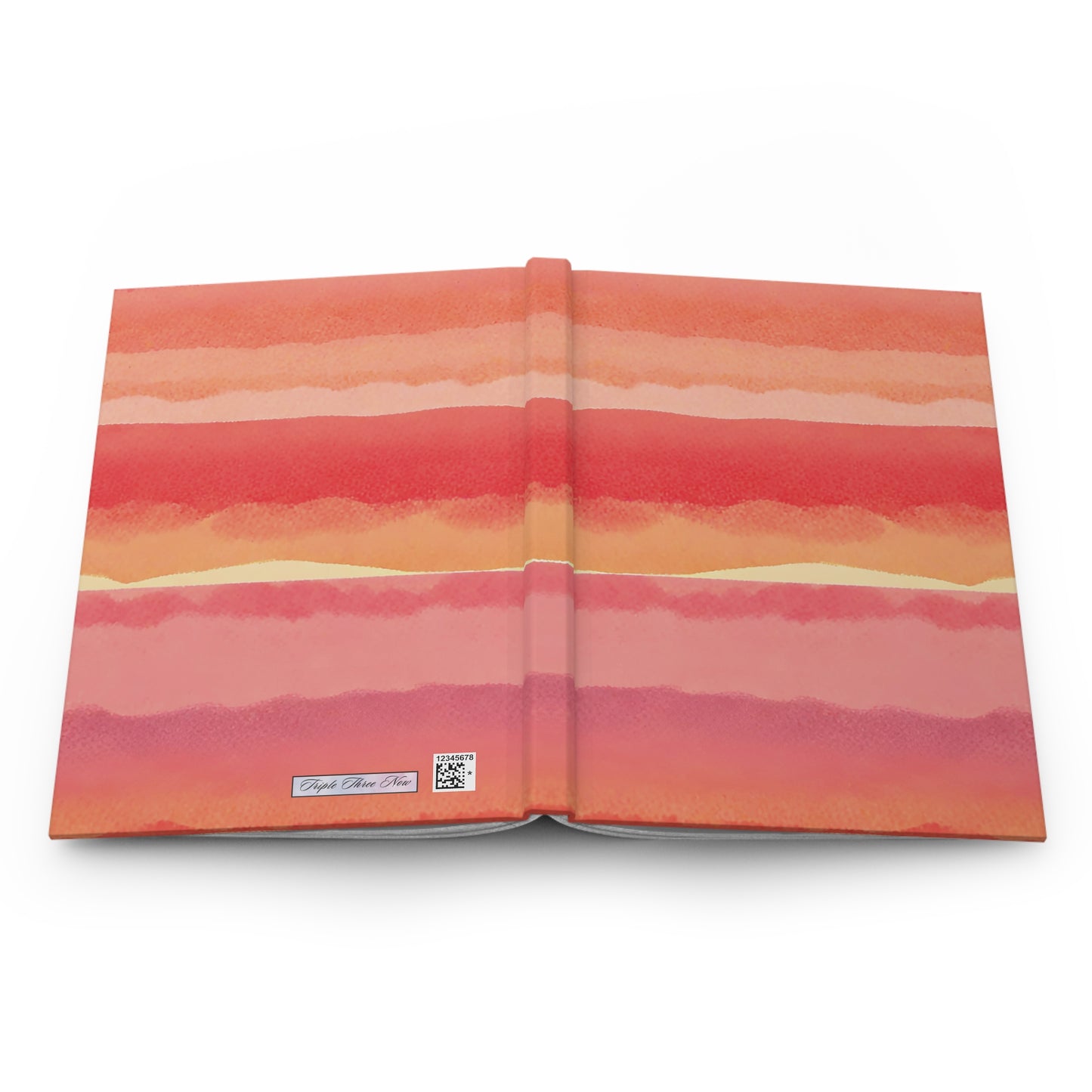 Open book with a colorful watercolor design on a white background