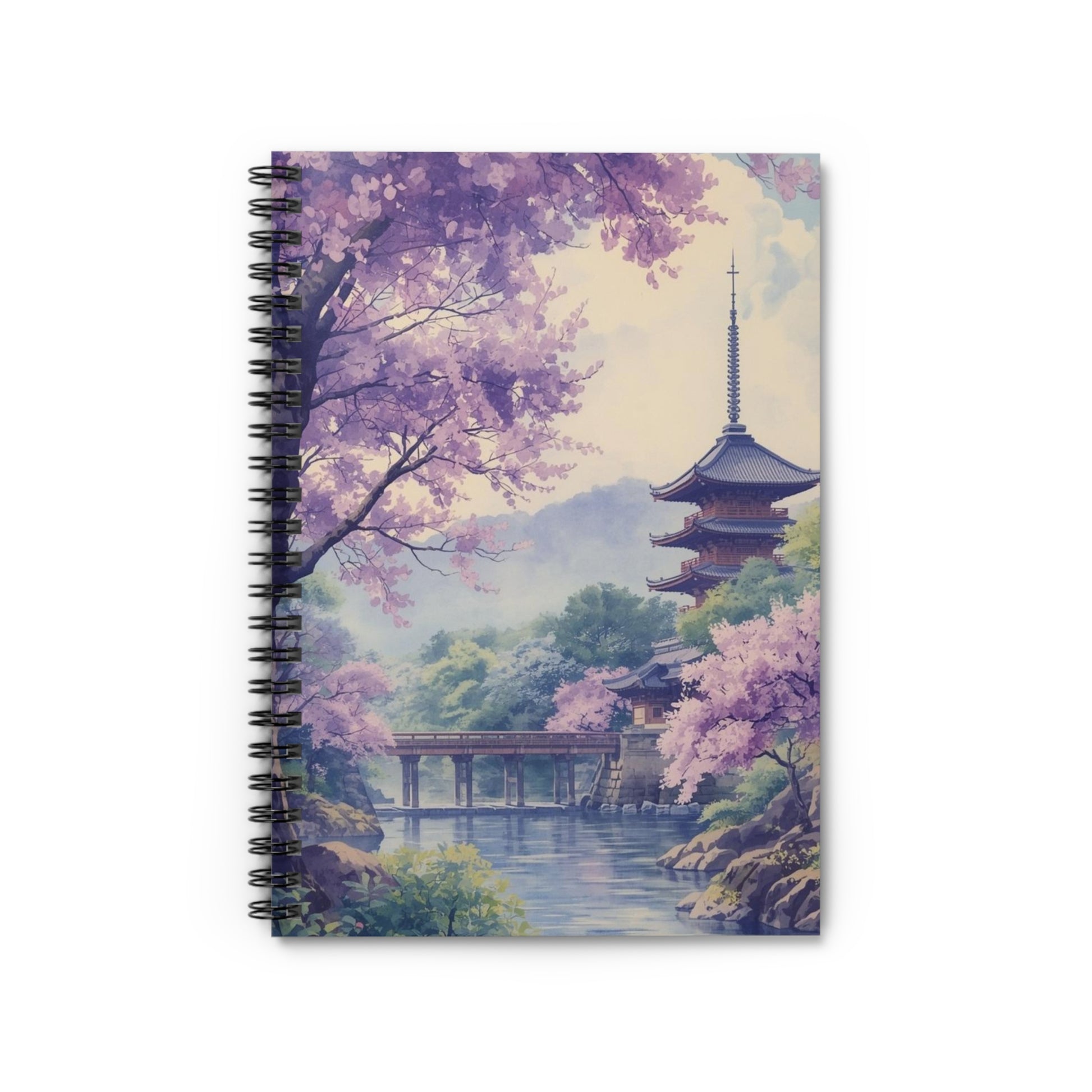 Notebook with a scenic design of cherry blossoms and a pagoda on the cover