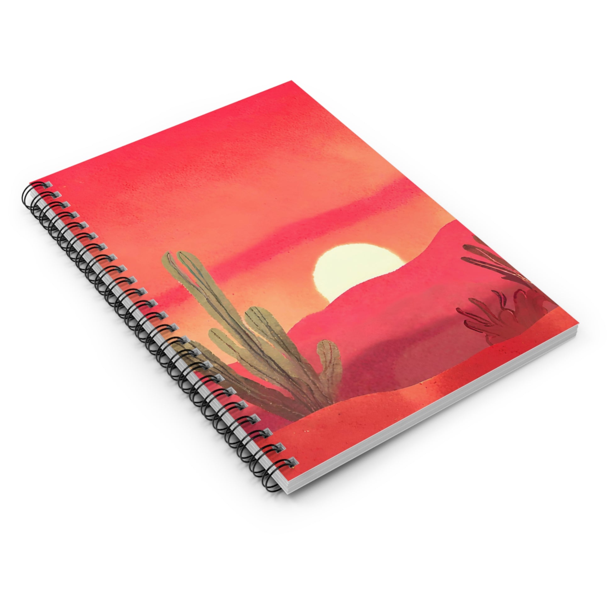 Notebook with a desert sunset design on the cover