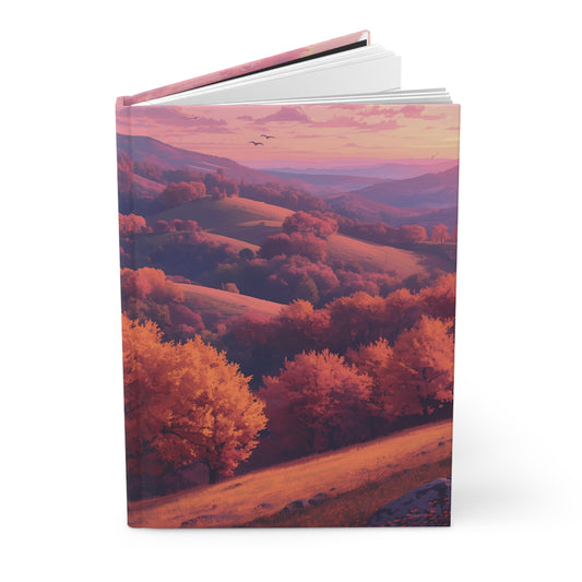 Book with a cover featuring a scenic landscape of trees and hills at sunset.