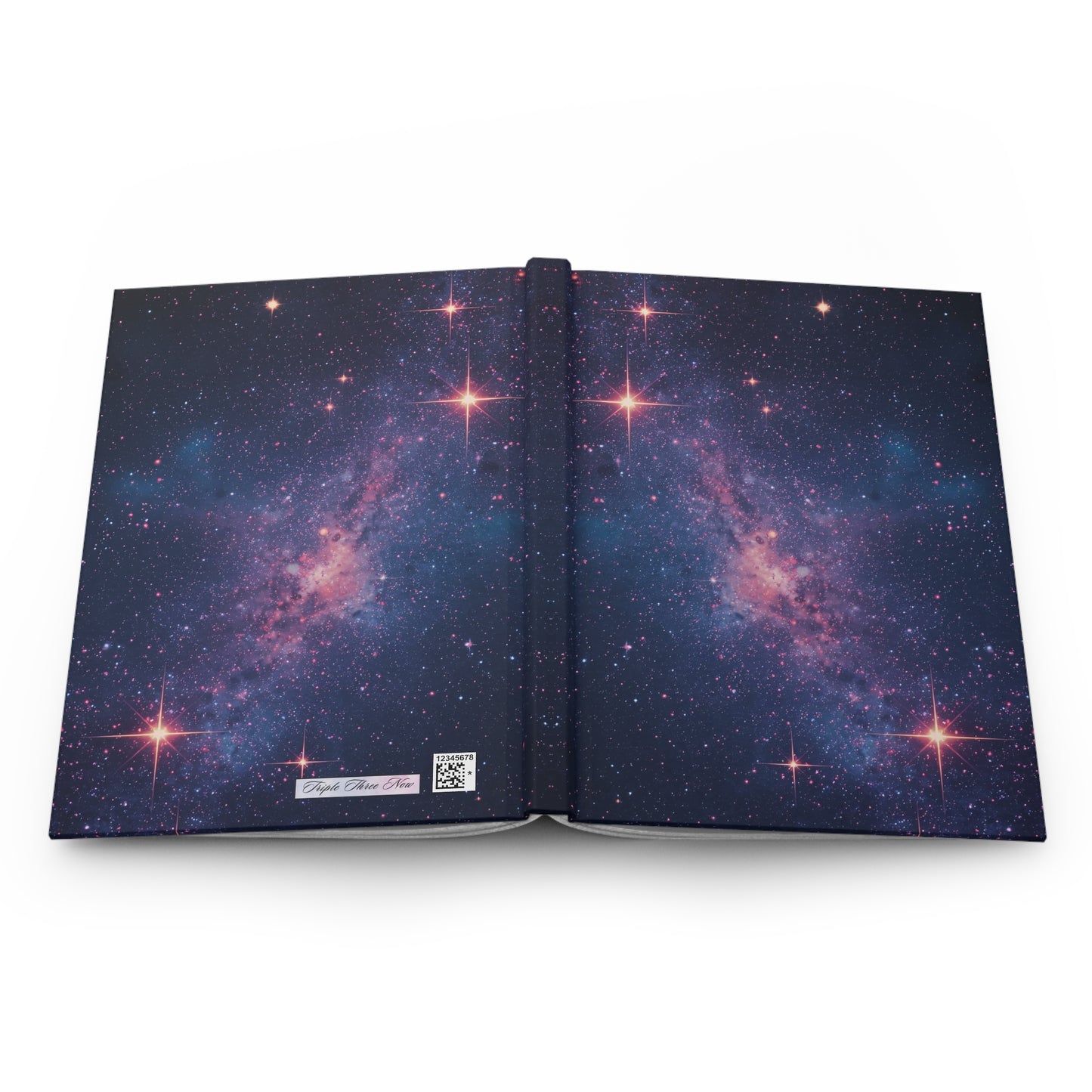 Open book with a space-themed design on a white background
