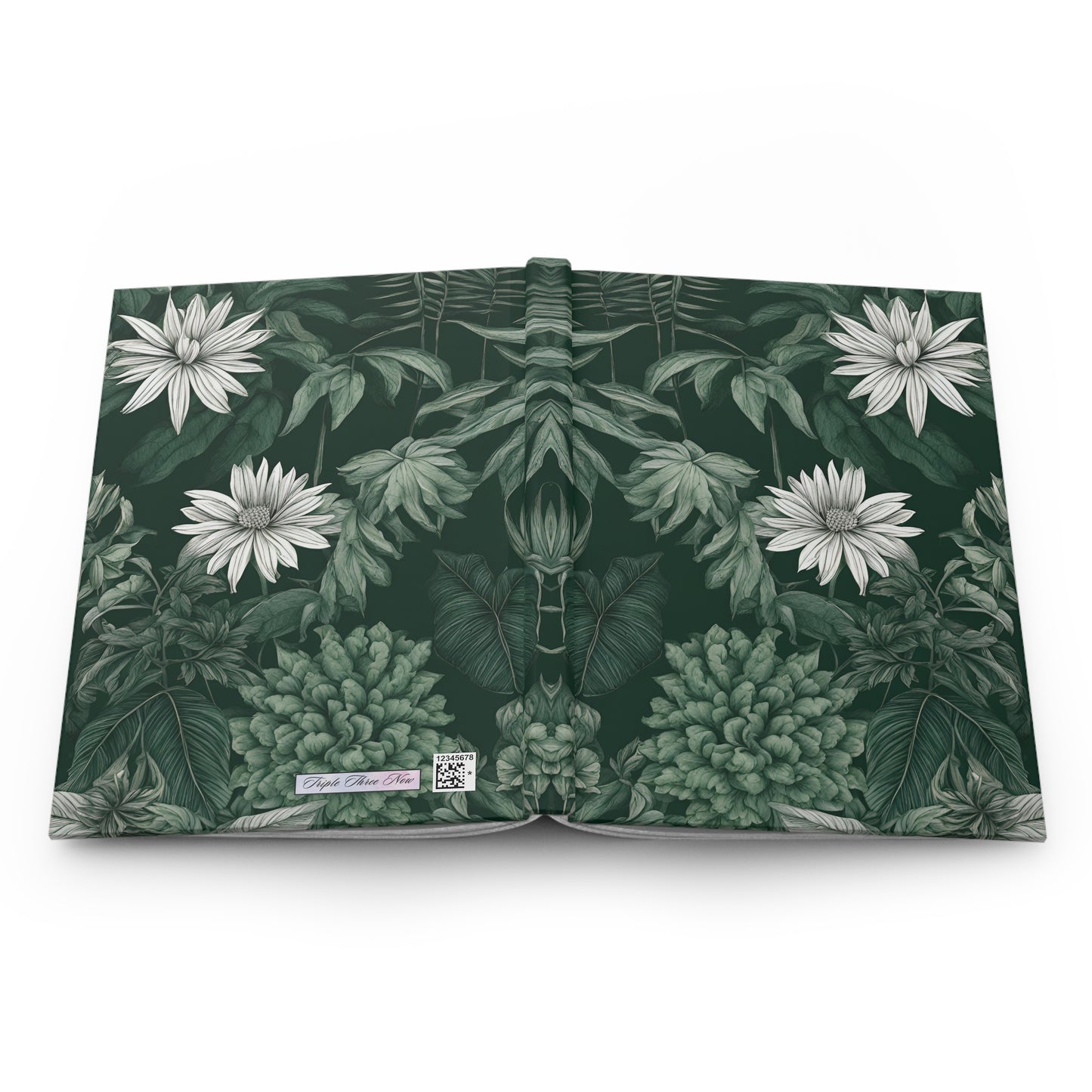 Book with a green botanical design on a white background