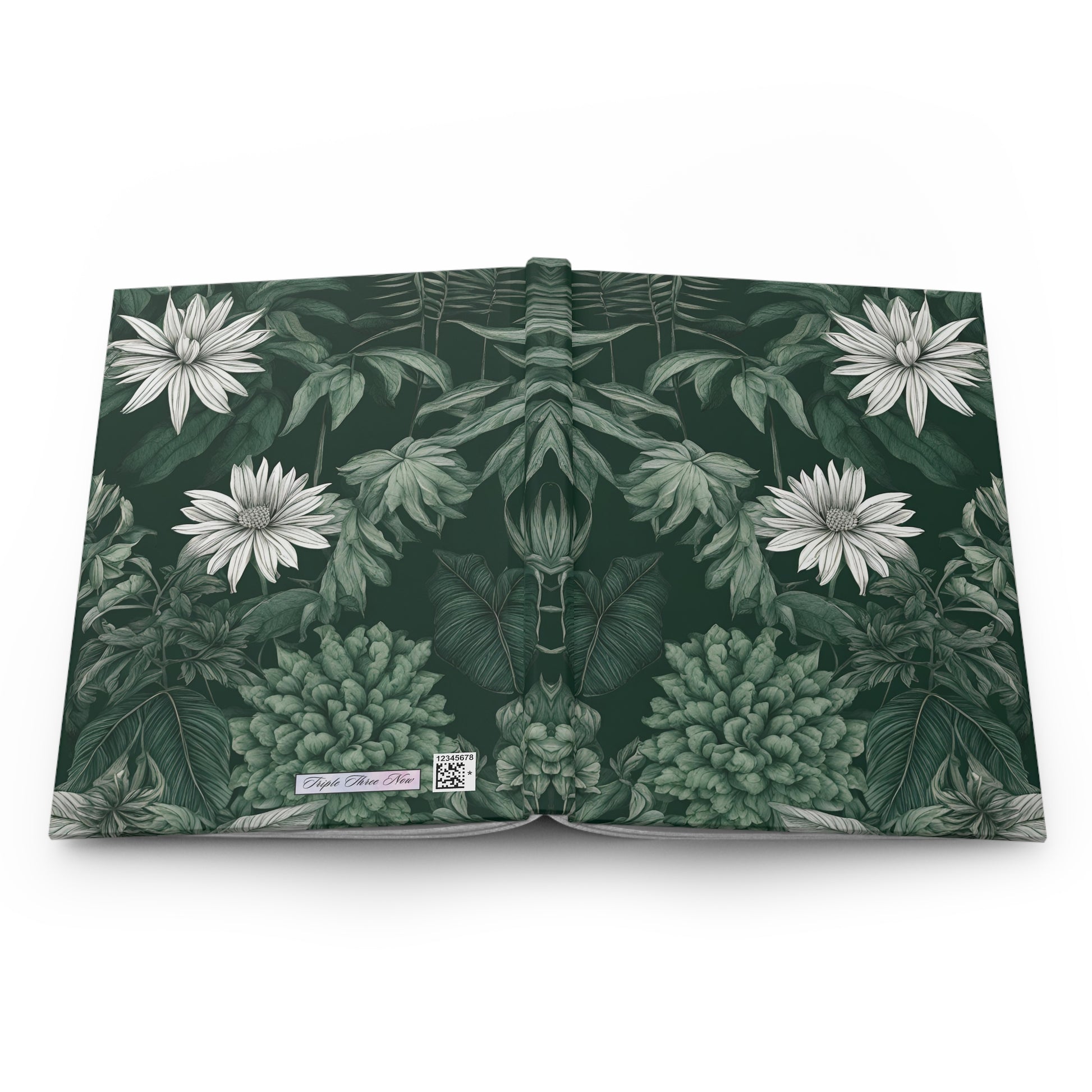 Book with a green botanical design on a white background