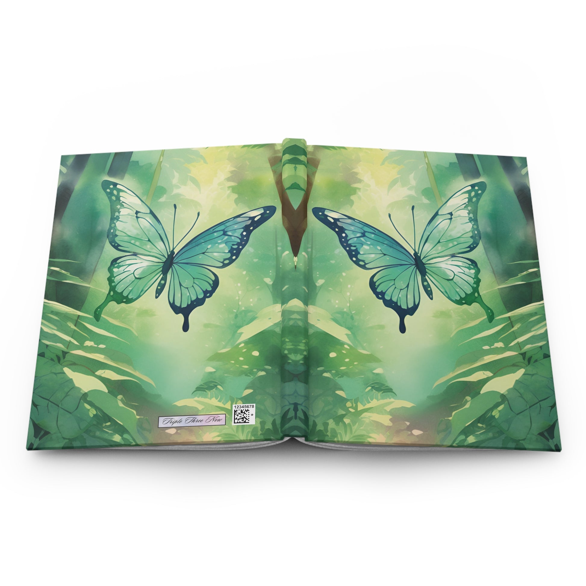 Open book with green butterfly design on a white background
