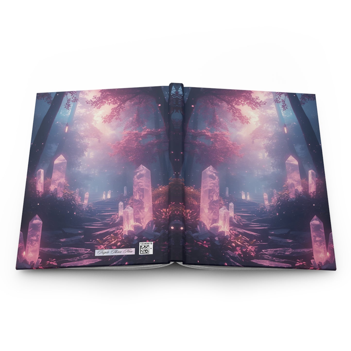 Open book with a fantasy landscape design on a white background