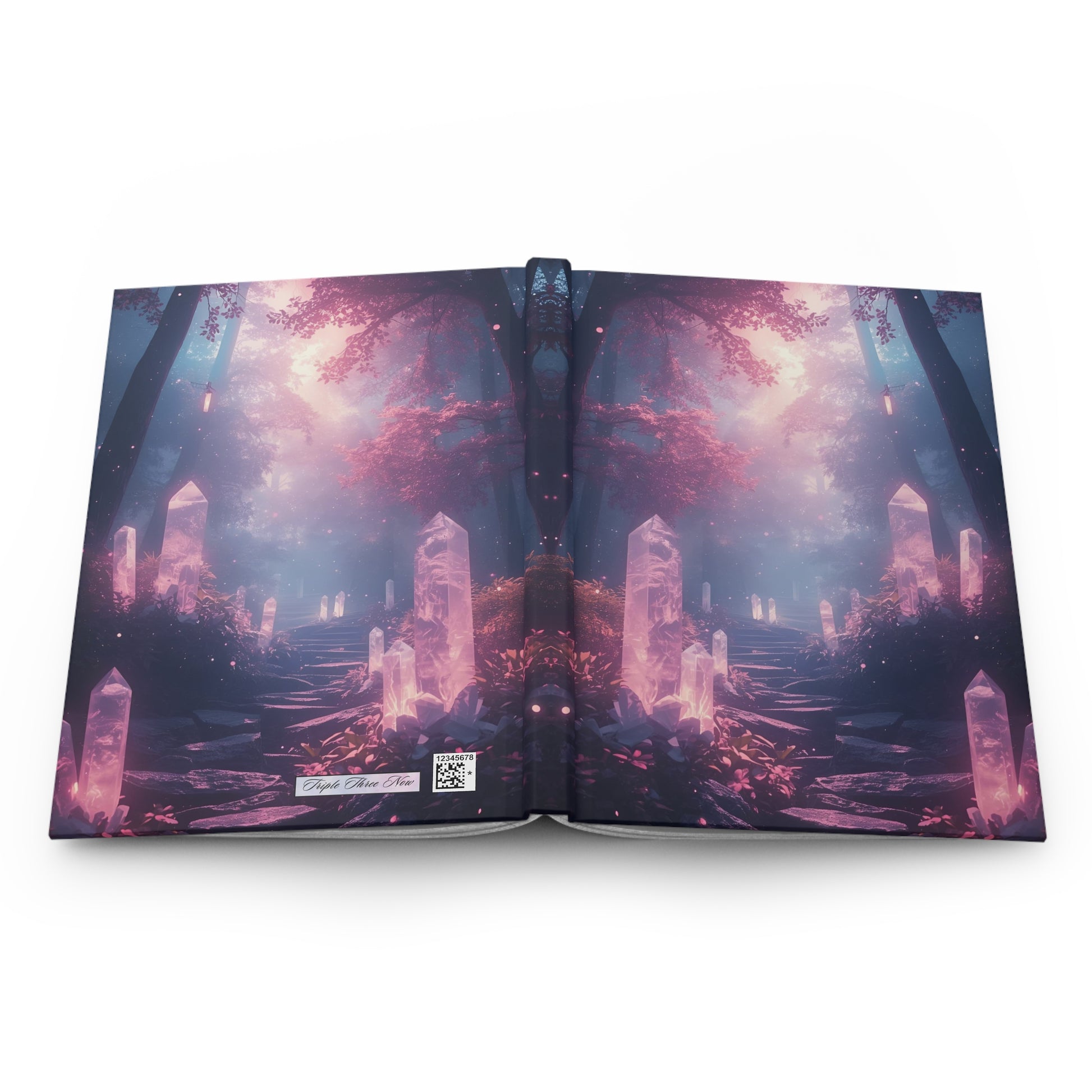 Open book with a fantasy landscape design on a white background